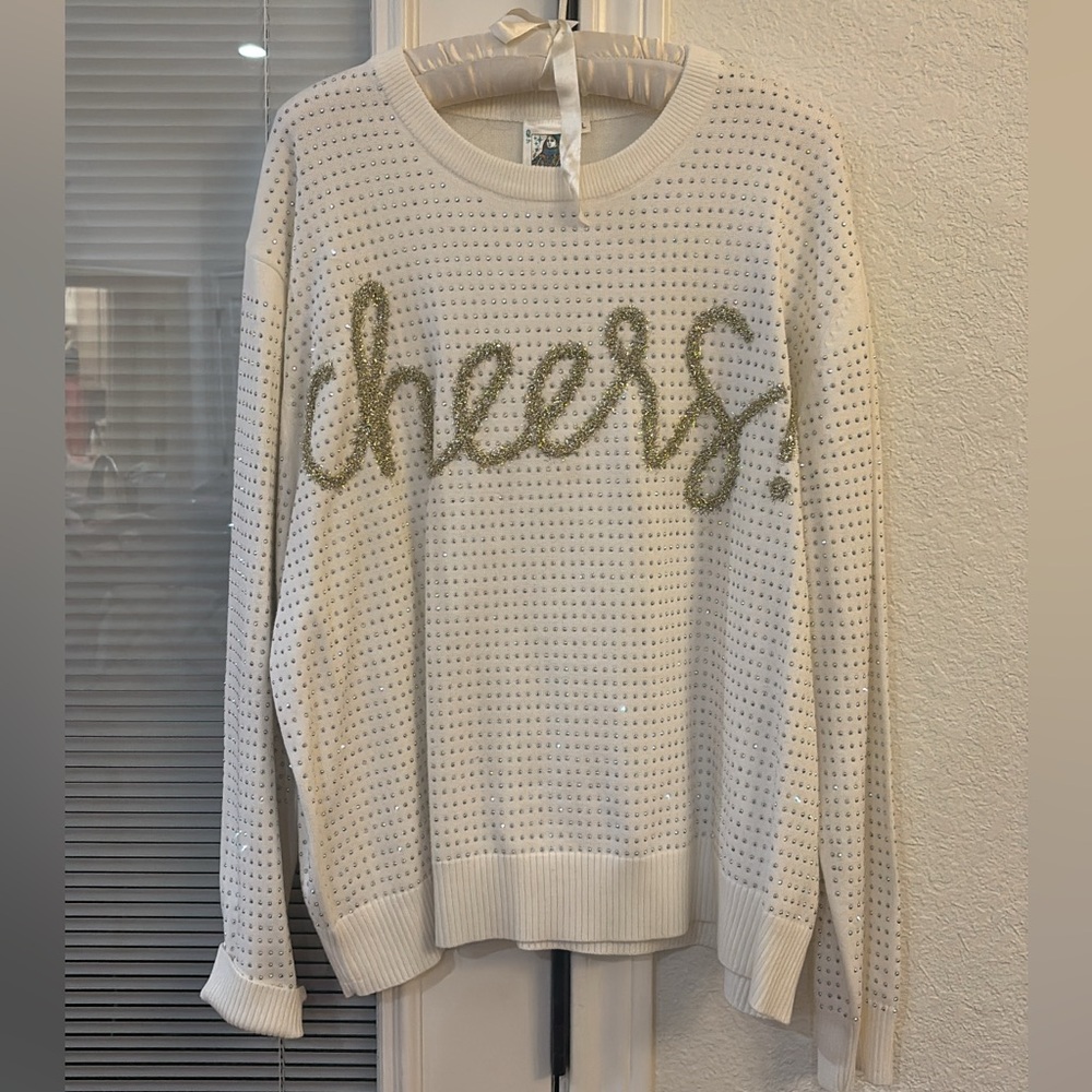 QUEEN OF SPARKLES White Sweater with Gold 'Cheers' Design